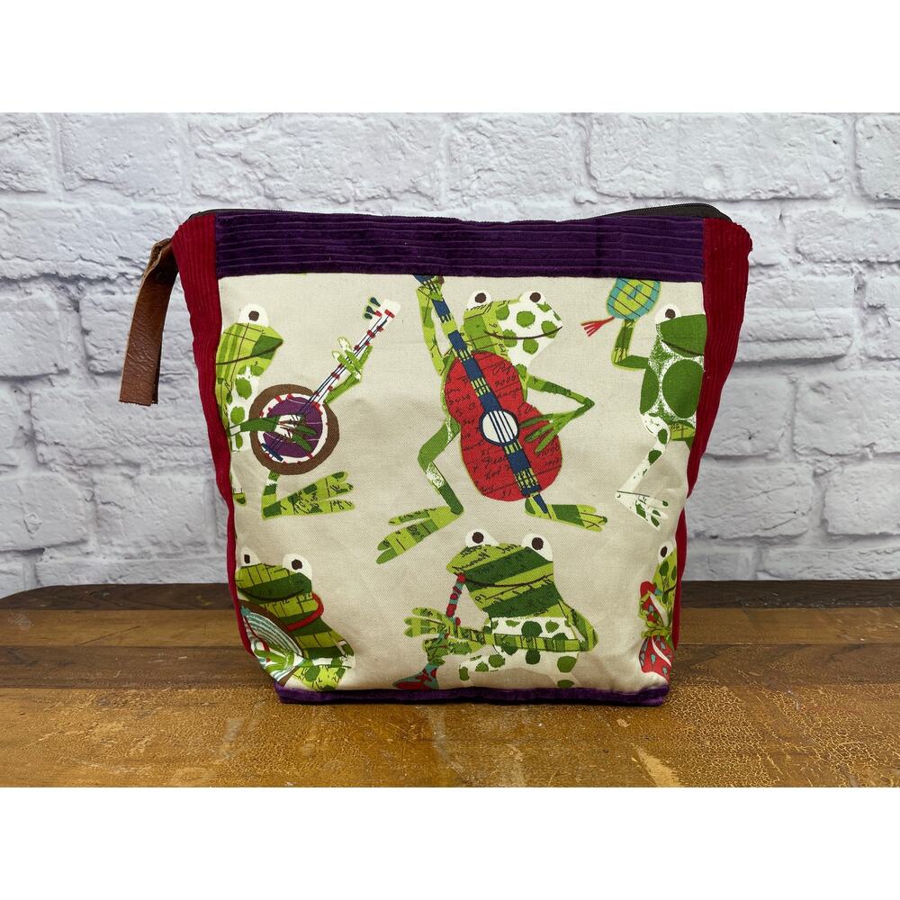 Musical frogs travel bag